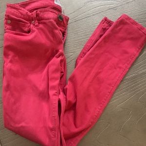 Bright pink skinny jeans